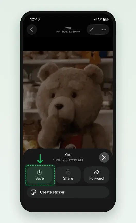 Screenshot of WhatsApp on an iPhone: a GIF opened from a chat with Save, Share, Forward and Create sticker below it, Save marked.