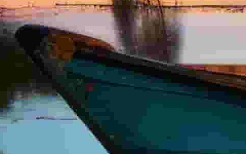 Lower image quality at 10: the same crop from the 80.8 KB file, blocky, the water broken into squares of colour