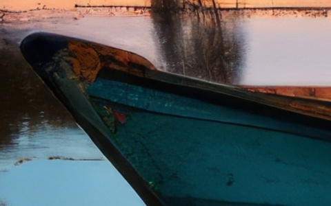 Lower image quality, before: the bow of the boat in our 9.8 MB camera photo at full size, the cracks in its paint sharp